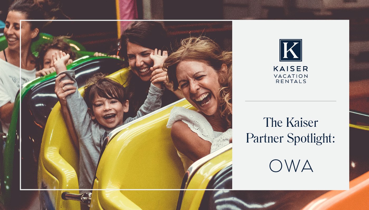 family laughing while riding an amusement park ride